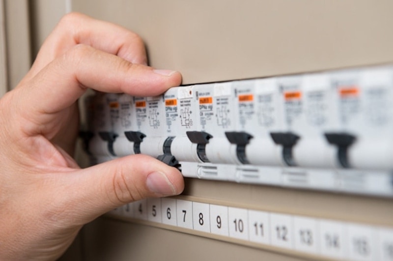 electrician testing the switchboard